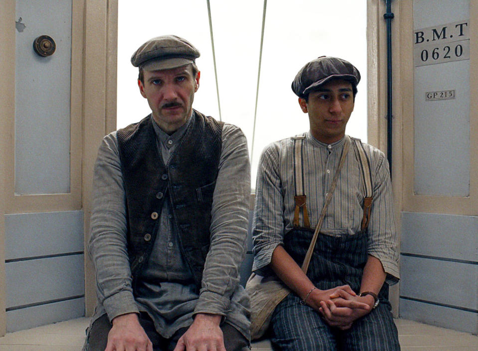 This image released by Fox Searchlight shows Ralph Fiennes, left, and Tony Revolori in "The Grand Budapest Hotel ." (AP Photo/Fox Searchlight)