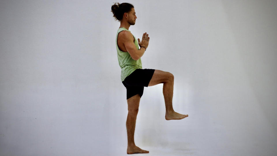 Elisei Rusu demonstrating one legged chair pose