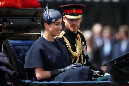 Britain's Prince Harry and Meghan, Duchess of Sussex take part in the Trooping the Colour parade in central London