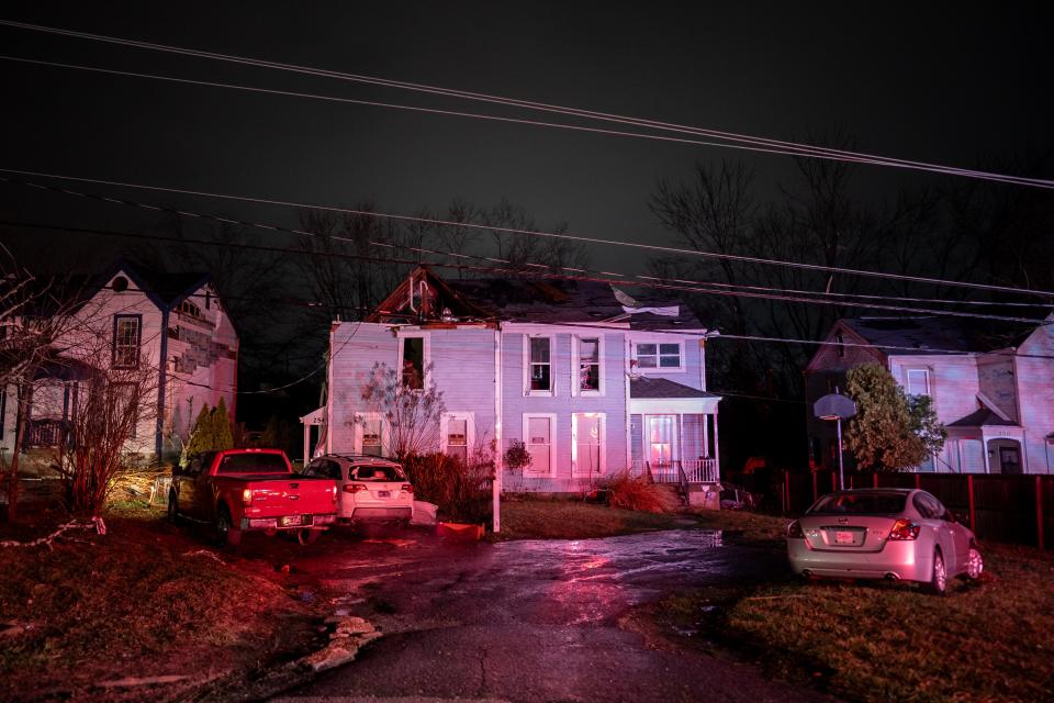 Damage is seen on Nesbitt Lane in the Madison area of Nashville, Tenn., Saturday, Dec. 9, 2023. At least six people are dead and more than 150,000 are without power after storms containing tornadoes and high winds hit Middle Tennessee.