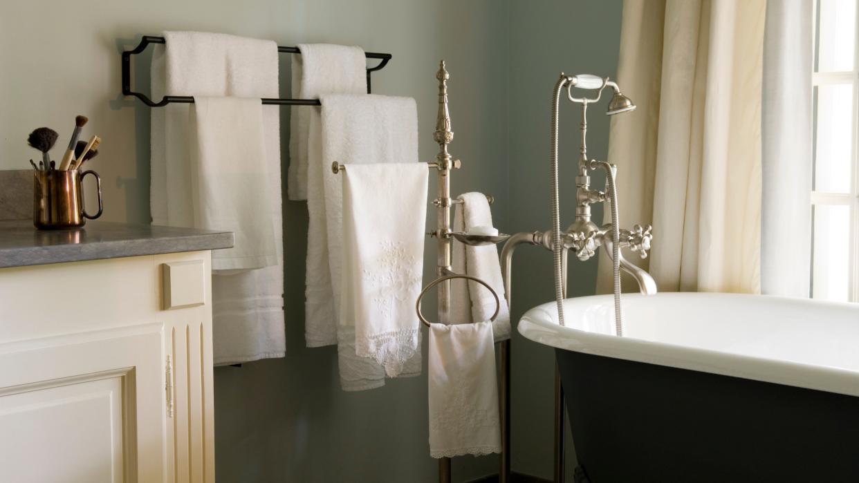  Towels in beautiful bathroom with bathtub 