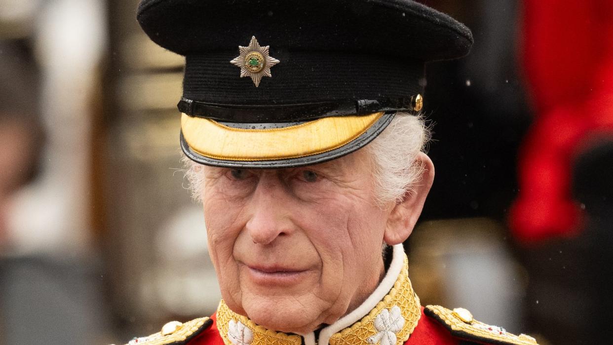 king charles smiling at trooping in military uniform