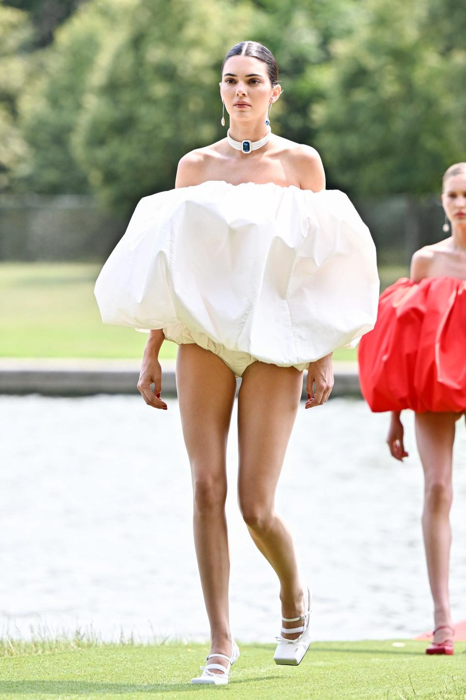 Kendall Jenner walks the runway during "Le Chouchou" Jacquemus' Fashion Show at Chateau de Versailles in in Versailles, France in June 2023.