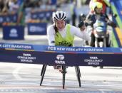Tatyana McFadden of the U.S. crosses the finish line to win the womens wheelchair division of the 2016 New York City Marathon in Central Park in the Manhattan borough of New York City, New York, U.S. November 6, 2016. REUTERS/Mike Segar