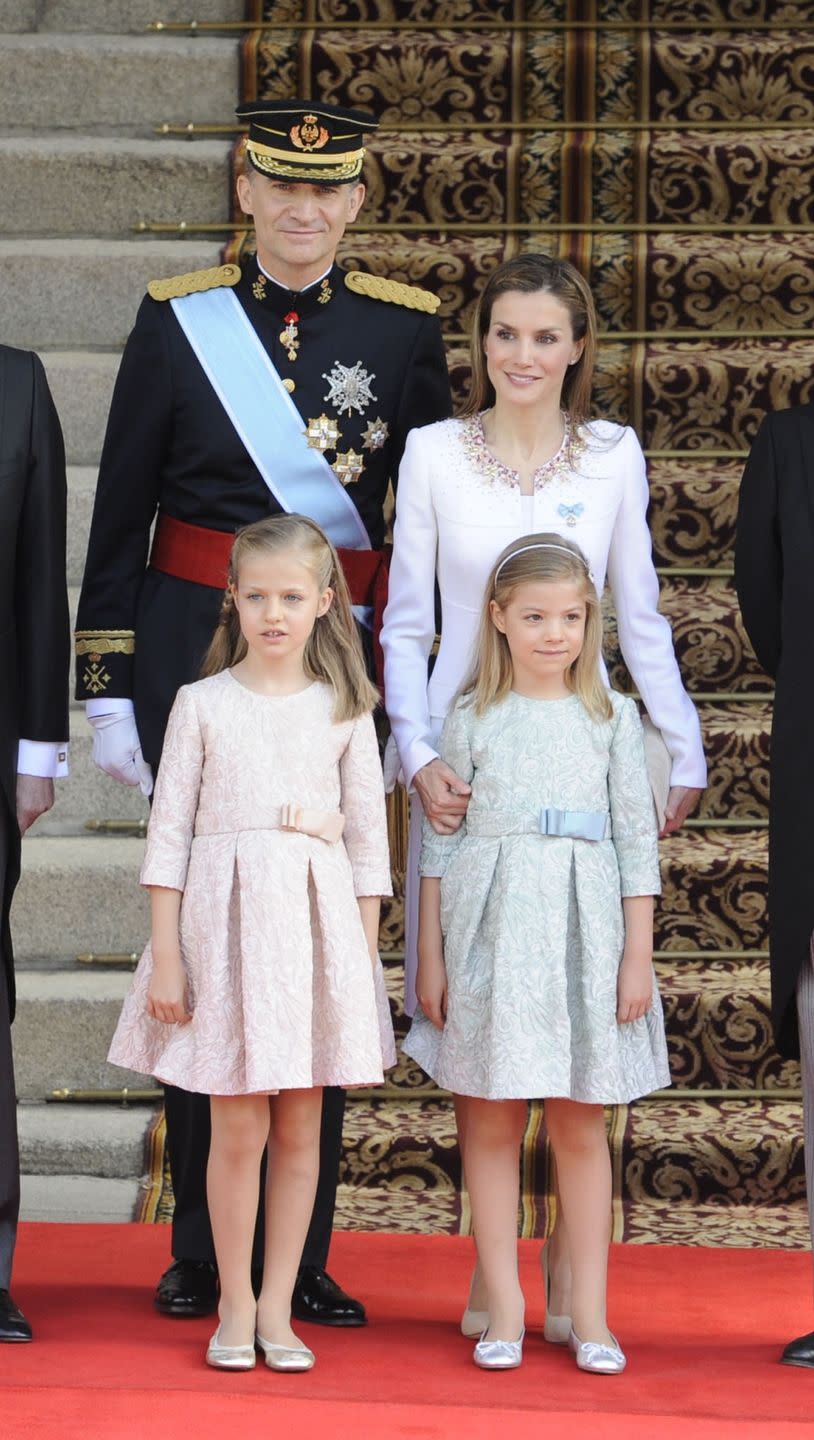 <p>Princesses Leonor and Sofia looked adorable in co-ordinating dresses for their father's big day—his coronation as King Felipe VI of Spain. </p>