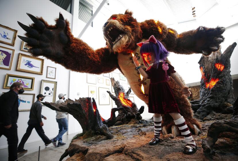 LOS ANGELES, CA - NOVEMBER 02: Annie and Tibbers statue greets Rioters as they enter Riot Games Los Angeles headquarters. Annie is one of the champions and Tibbers is her teddy bear. Riot Games is the company behind the game League of Legends. In November, League of Legends will move into television via the the Netflix series 'Arcane.' Arcane is set in the League of Legends world as Riot Games is aiming to become a new-look entertainment firm, using its original video game IP to expand into the worlds of television and music as well as immersive theater. Riot Games on Tuesday, Nov. 2, 2021 in Los Angeles, CA. (Al Seib / Los Angeles Times).