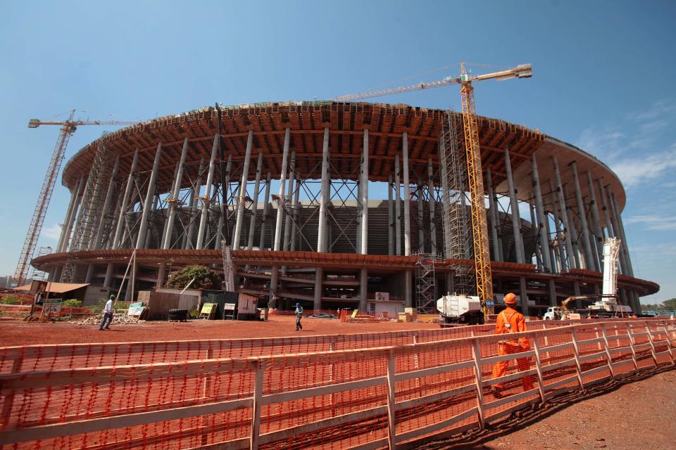 Construction continues at Brasilia's National Stadium in Brasilia, Brazil, Wednesday, Sept. 26, 2012. According to Portal da Copa, a Brazilian federal government website, over 70% of the work is finalized. Brasilia will host the opening match of the 2013 FIFA Confederations Cup and will also be one of the host cities for the 2014 FIFA World Cup soccer tournament. (AP Photo/Eraldo Peres)