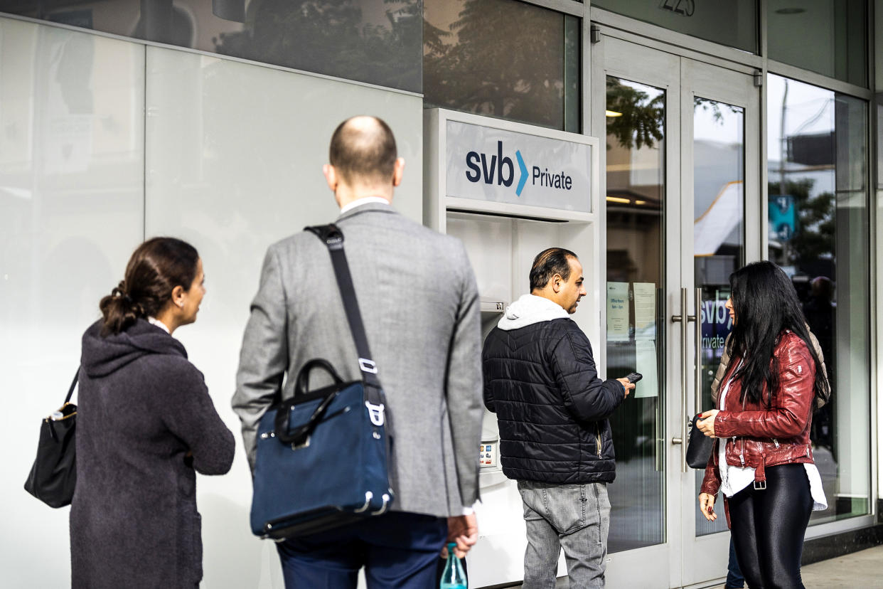 Customers outside a Silicon Valley Bank branch in Beverly Hills, Calif., on March 13, 2023. (Lauren Justice / Bloomberg via Getty Images)