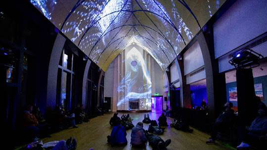  The high-arching ceilings at Historic Rhode Island church are alit with Epson projectors. . 