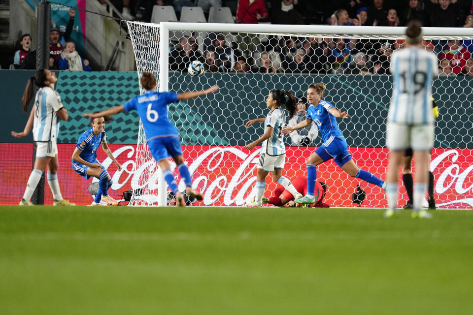 Italy's Cristiana Girelli, right, scores her side's first goal during the Women's World Cup Group G soccer match between Italy and Argentina at Eden Park in Auckland, New Zealand, Monday, July 24, 2023. (AP Photo/Abbie Parr)