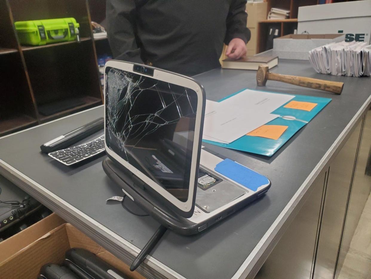 The damaged computer was used as an electronic poll book and had been set aside as surplus property.