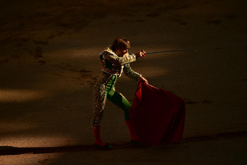 FILE - A bullfighter performs in the bullring during the San Fermin festival in Pamplona, northern Spain, Monday, July 11, 2022. (AP Photo/Alvaro Barrientos, File)