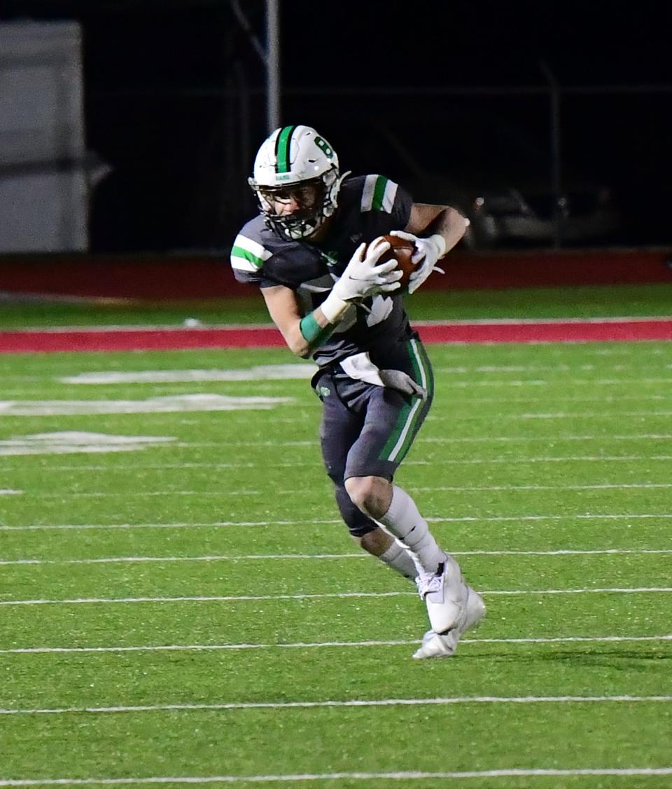 Eric Rawlings picks off a Granville pass late in the fourth quarter to seal Badin's 14-0 win at the OHSAA Division III state football semifinals, Nov. 26, 2021.