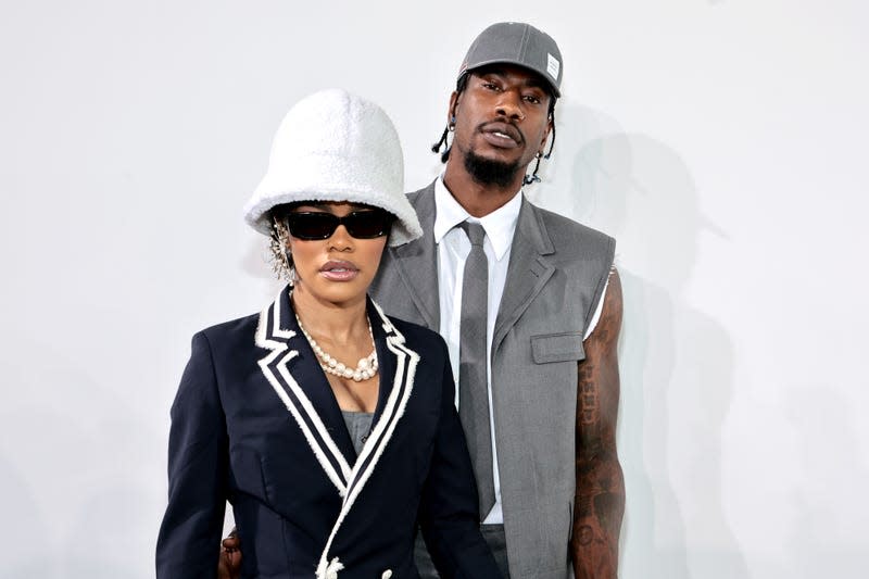 Teyana Taylor and Iman Shumpert attend the Thom Browne Fall 2022 runway show on April 29, 2022 in New York City. - Photo: Jamie McCarthy (Getty Images)