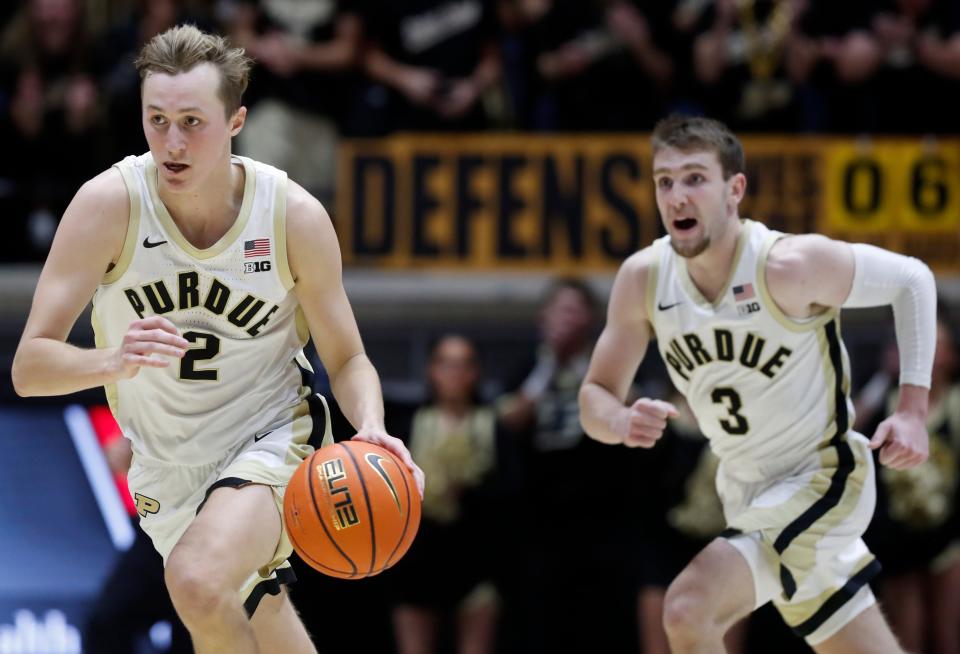Purdue Boilermakers guard Fletcher Loyer (2) and Purdue Boilermakers guard Braden Smith (3) transition on a breakaway during the NCAA men’s basketball game against the Xavier Musketeers, Monday, Nov. 13, 2023, at Mackey Arena in West Lafayette, Ind. Purdue Boilermakers won 83-71.