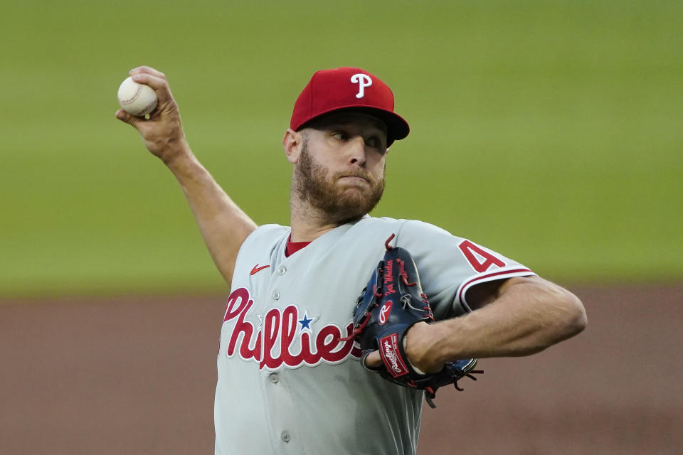 Philadelphia Phillies starting pitcher Zack Wheeler delivers in the first inning of a baseball game against the Atlanta Braves, Friday, April 9, 2021, in Atlanta. (AP Photo/John Bazemore)