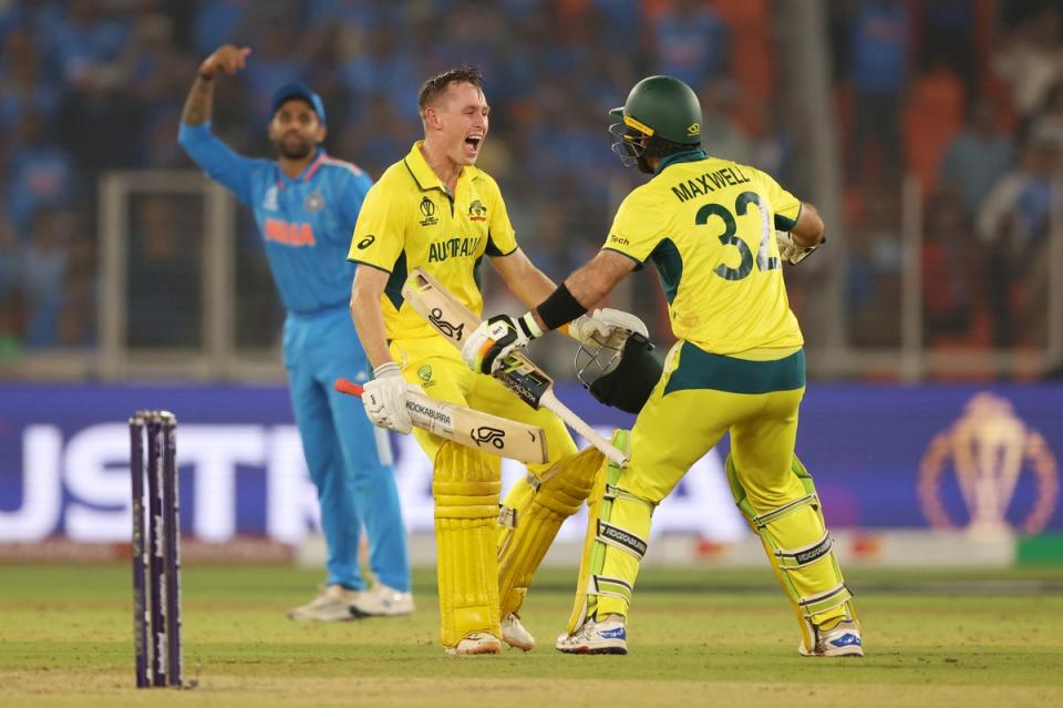 Marnus Lasbuchagne and Glenn Maxwell celebrate the moment of victory (Getty)