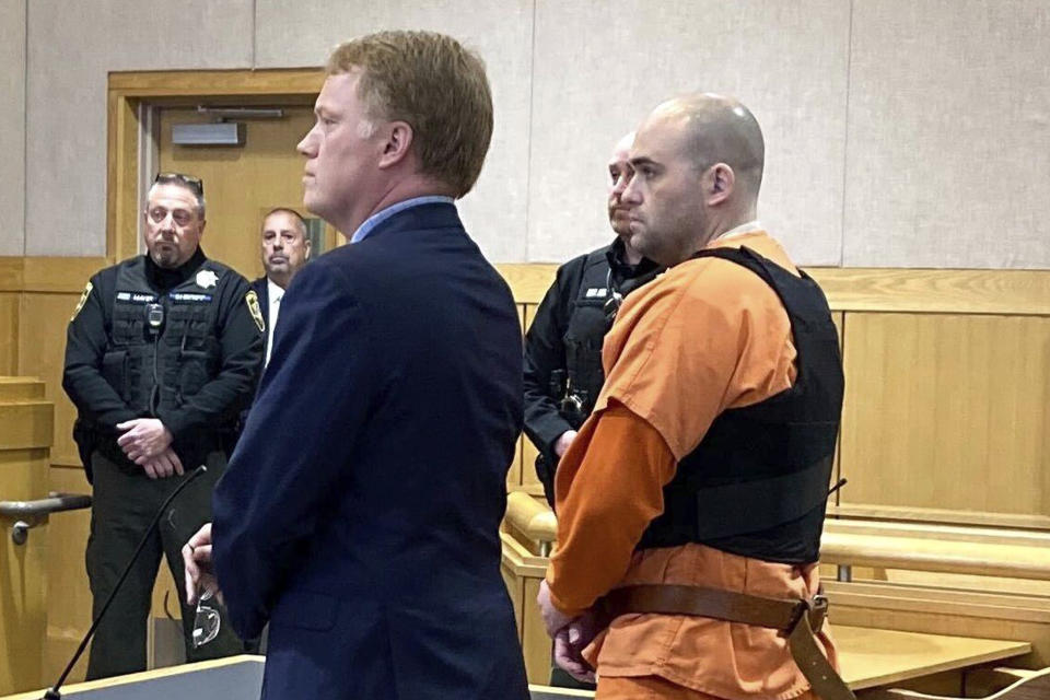 Joseph Eaton, the suspect in a shooting spree in Maine, appears in court in West Bath, Maine, Thursday, April 20, 2023. Eaton, who police say confessed to killing four people in a home and then shot three others randomly on a busy highway Tuesday, had been released days earlier from prison. (AP Photo/Patrick Whittle)