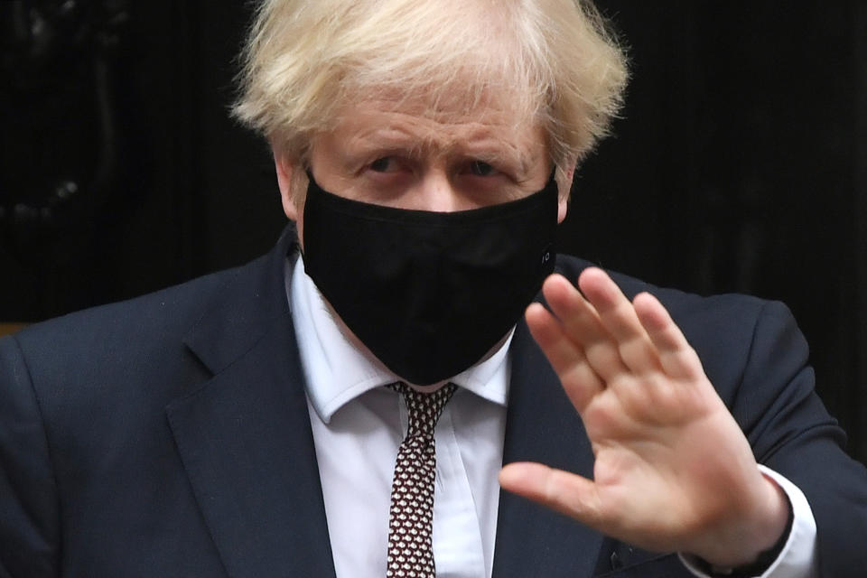 LONDON, ENGLAND - JANUARY 13: Prime Minister, Boris Johnson leaves number 10 Downing Street  for PMQs at the House of Commons on January 13, 2021 in London, England.  (Photo by Chris J Ratcliffe/Getty Images)