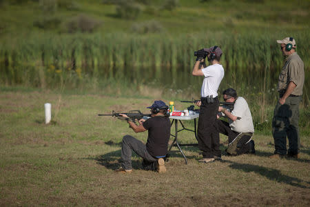 Trainees take part in a shooting exercise at the Cherev Gidon Firearms Training Academy in Honesdale, Pennsylvania, U.S. August 5, 2018. REUTERS/Noam Moskowitz