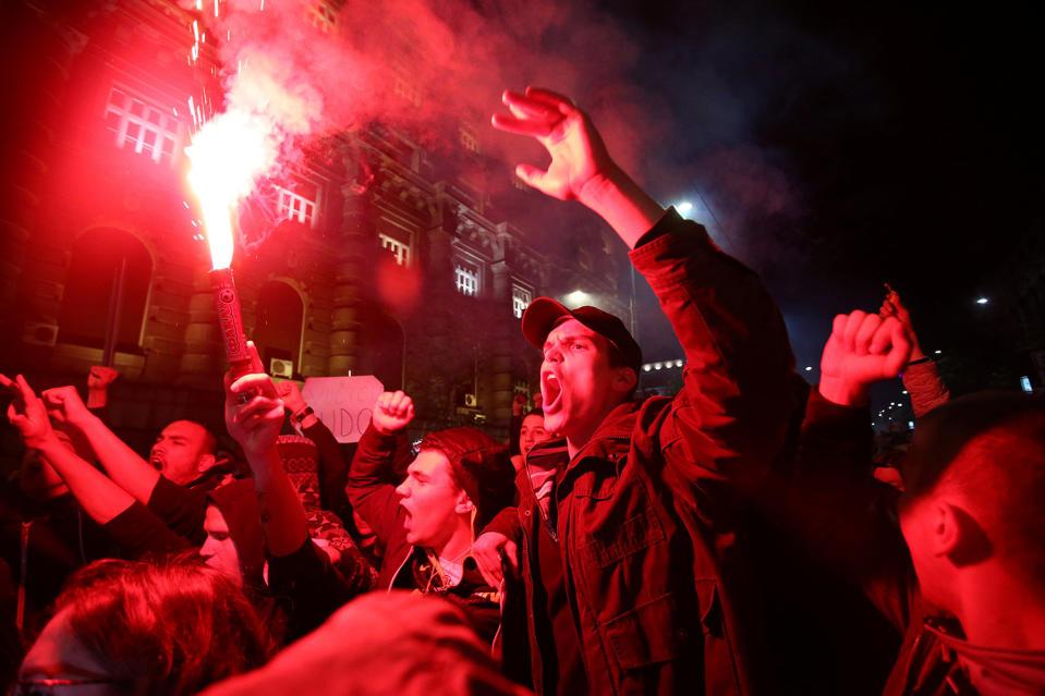 Protesters take part in a demonstration in Belgrade