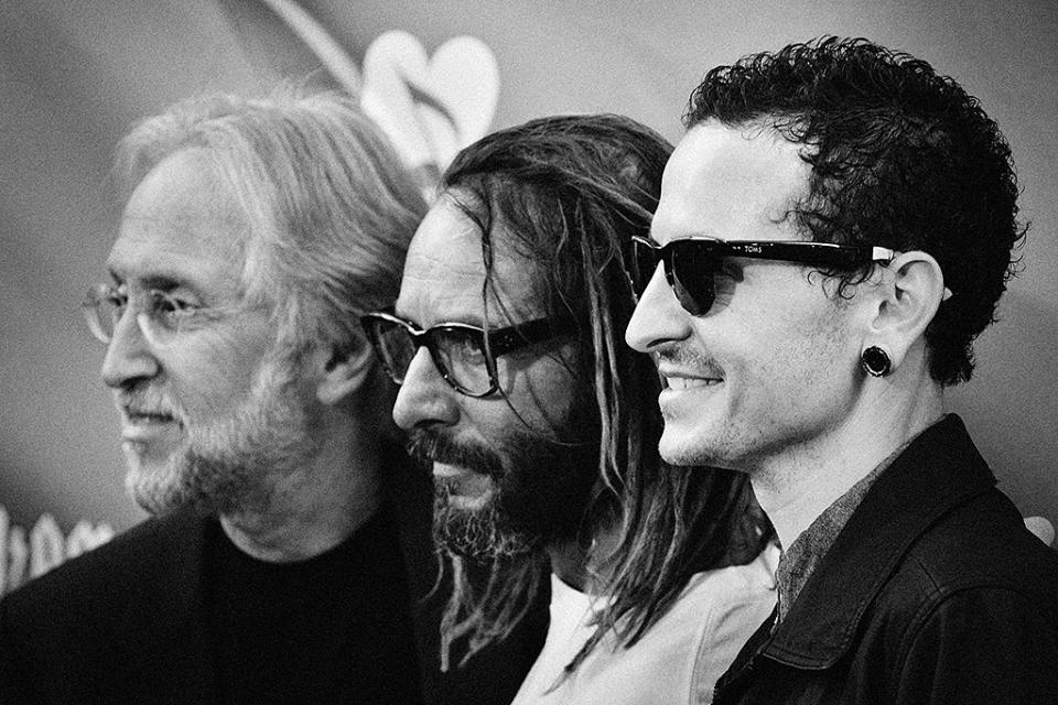 <p>Grammy President Neil Portnow, Tony Alva and Stone Temple Pilots frontman Chester Bennington arrive at the 9th Annual MusiCares MAP Fund Benefit Concert at Club Nokia on May 30, 2013 in Los Angeles, California. (Photo: Jerod Harris/WireImage) </p>