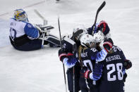 <p>Players from the United States celebrate after Dani Cameranesi (24), of the United States, scores a goal against Finland during the third period of the semifinal round of the women’s hockey game at the 2018 Winter Olympics in Gangneung, South Korea, Monday, Feb. 19, 2018. (AP Photo/Julio Cortez) </p>