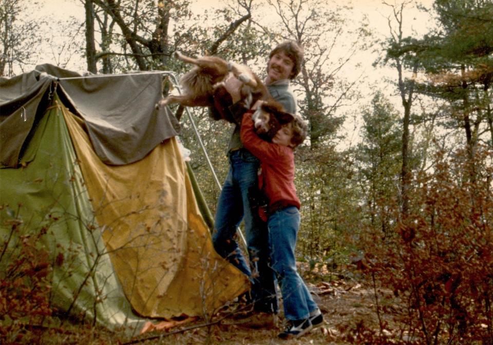 John Lavender II and his son Jason next to tent where they stayed before the castles were built.