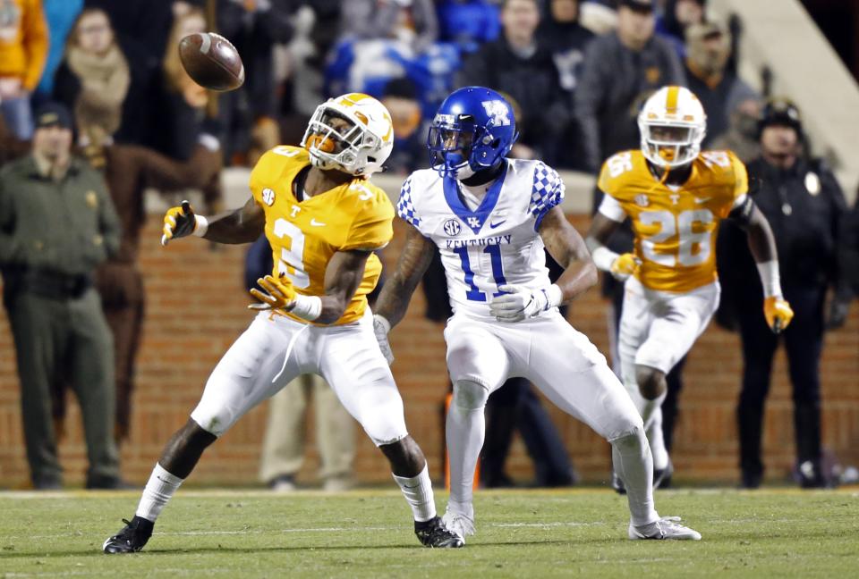 Tennessee defensive back Marquill Osborne (3) intercepts a ball intended for Kentucky wide receiver Tavin Richardson (11) in the second half of an NCAA college football game Saturday, Nov. 10, 2018, in Knoxville, Tenn. Tennessee won 24-7. (AP Photo/Wade Payne)