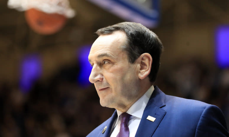 Coach K walks onto the floor during a Duke game.