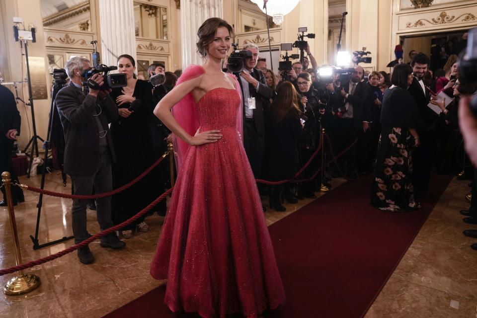 Dancer Anna Olkhovaya arrives to attend La Scala opera house's gala season opener, Giuseppe Verdi's opera 'Don Carlo' at the Milan La Scala theater, Italy, Thursday Dec. 7, 2023. The season-opener Thursday, held each year on the Milan feast day St. Ambrose, is considered one of the highlights of the European cultural calendar. (AP Photo/Luca Bruno)