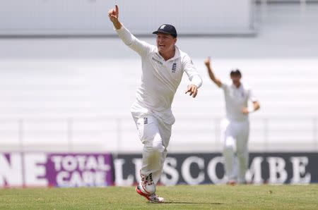 Cricket - West Indies v England - Second Test - National Cricket Ground, Grenada - 25/4/15 England's Gary Ballance celebrates after James Anderson ran out Jason Holder Action Images via Reuters / Jason O'Brien Livepic EDITORIAL USE ONLY.