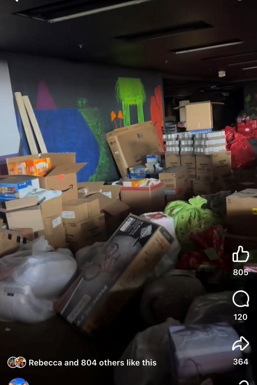 A screen grab from a Live Love Nashville Facebook video Dec. 10, 2023, showing food and toys for the disadvantaged remained largely intact after a tornado heavily damaged the Big Play Entertainment Center in Hendersonville, Tenn., where the supplies were being stored.
