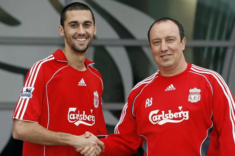Spanish footballer Alvaro Arbeloa (L) poses Liverpool Club manager Rafa Benitez at the Melwood Training ground in Liverpool , north-west  England, 01 Febuary 2007. The former Real Madrid back moves to the English Premiership after one season with Deportivo La Coruna.