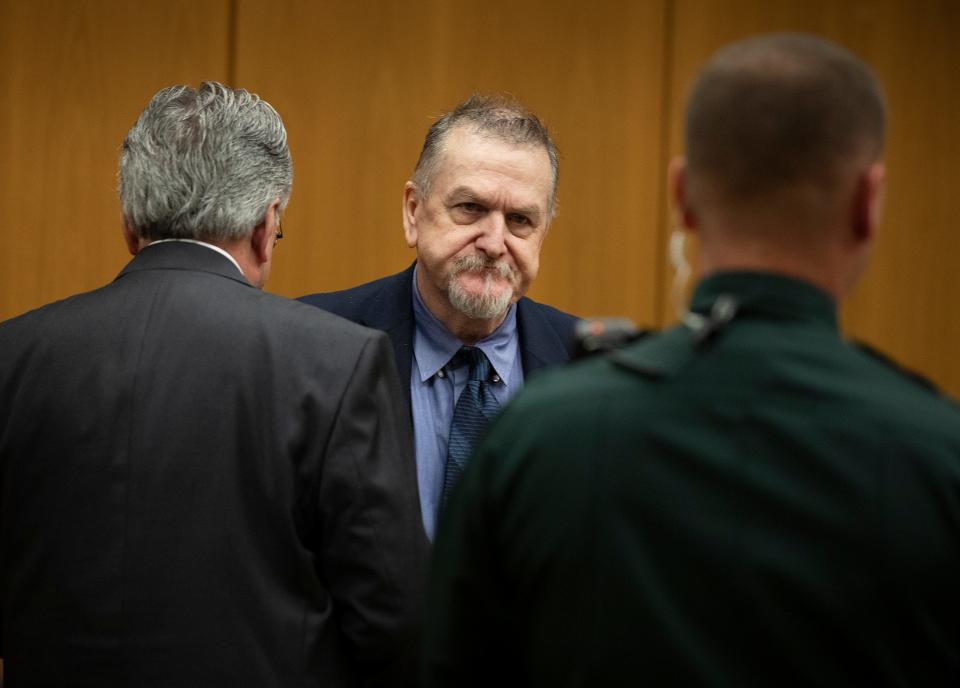 David Murdock walks out of the courtroom after the jury recommended life in prison for the murder of Lisa Bunce and attempted murder of Sanda Andrews.