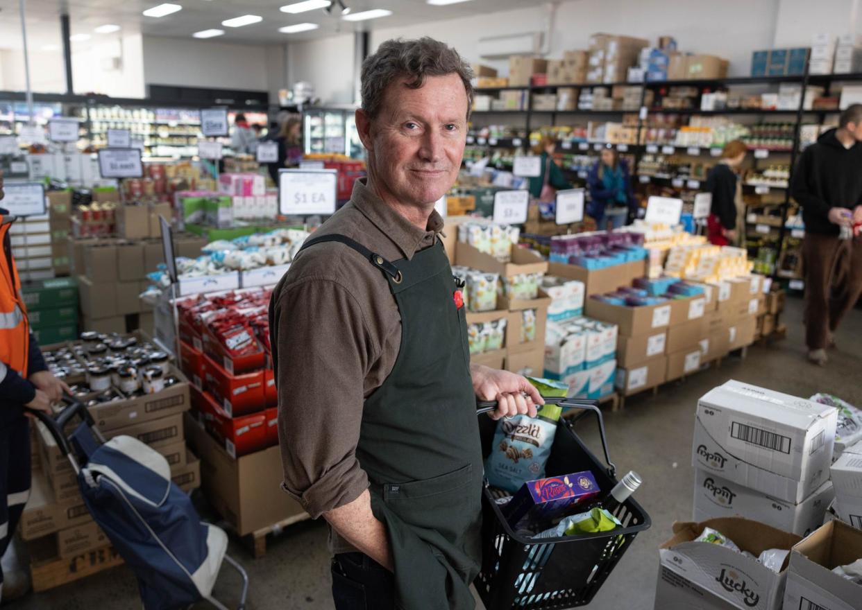 <span>Grant Miles at the Cheaper Buy Miles store in the Melbourne suburb of Brunswick. The discount concept has become so popular he has recently opened a fourth shop.</span><span>Photograph: Ellen Smith/The Guardian</span>