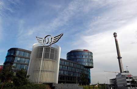 A sign of Waltrovka project is seen in front of an office building in Prague