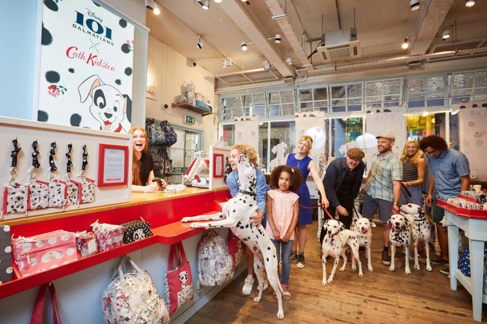 Little girl Anya in the queue with dalmatians at the Cath Kidston store in Covent Garden.