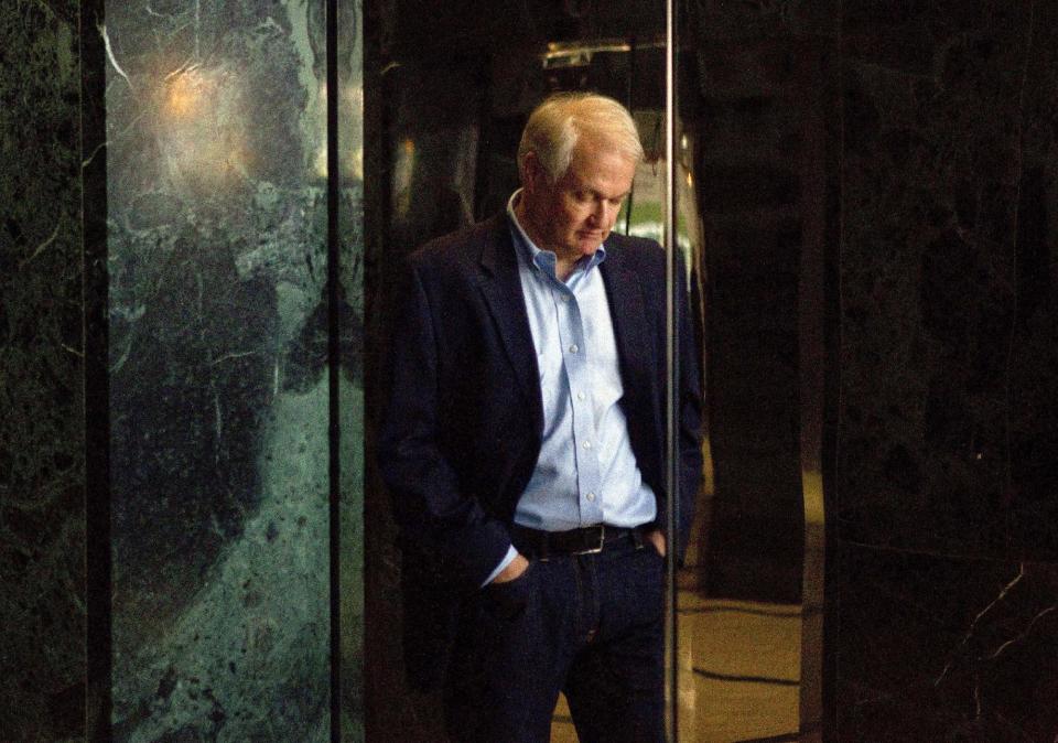 Donald Fehr, executive director of the NHPLA, is reflected in the doors of an elevator as he prepares to speak with the media following labor talks with the NHL in Toronto on Thursday, Aug. 23, 2012. Negotiations continue between the league and the players' union over collective bargaining as both sides try to avoid a potential lockout. (AP Photo/The Canadian Press, Chris Young)