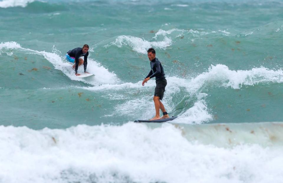 Surfers take advantage of the waves at the Bal Harbour Lighthouse on Wednesday, April 12, 2023 in Bal Harbour, Florida. Rip current risk remains in effect through until Thursday evening Source:National Weather Service.