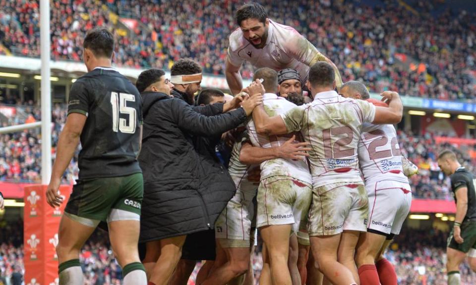 Georgian players celebrate scoring a try during the autumn IiWales.