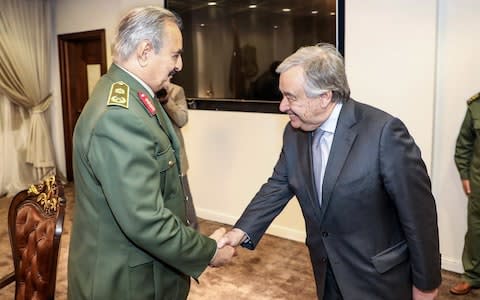 Khalifa Haftar shaking hands with United Nations Secretary General Antonio Guterres - Credit: AFP/Getty Images