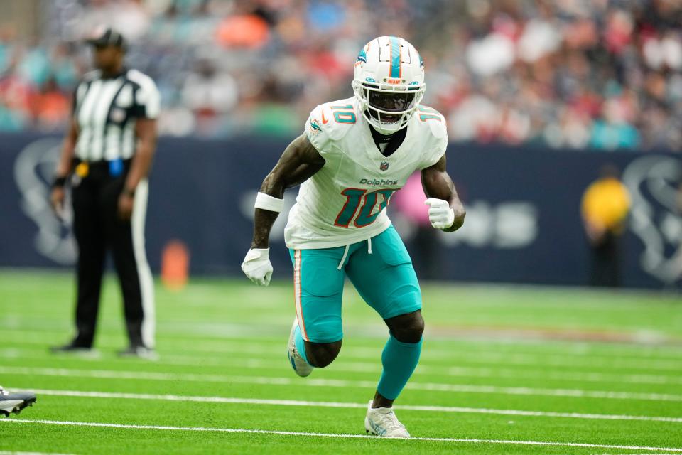 Miami Dolphins wide receiver Tyreek Hill runs a route against the Houston Texans during the first half of an NFL preseason football game, Saturday, Aug. 19, 2023, in Houston. (AP Photo/Eric Christian Smith)