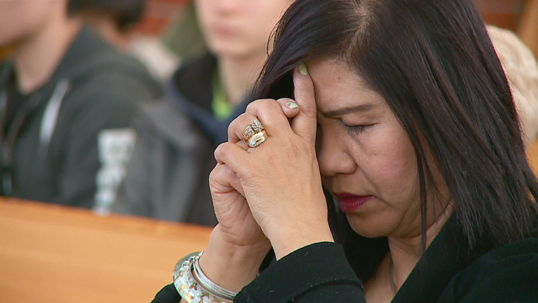 Catholics flock to Calgary church for glimpse of 465-year-old saint's arm