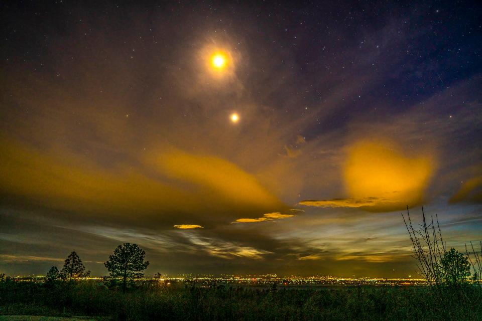 The moon and Venus shine bright over Redding at 7:45 p.m. on March 24, 2023.