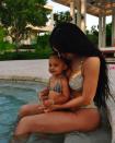<p>Kylie Jenner and her daughter Stormi share plenty of matching moments. In May 2021, Jenner <a href="https://www.instagram.com/p/COqnPrFnmMz/" rel="nofollow noopener" target="_blank" data-ylk="slk:shared a photo of the pair;elm:context_link;itc:0;sec:content-canvas" class="link ">shared a photo of the pair</a> enjoying some time by the pool in rainbow two-pieces. </p>