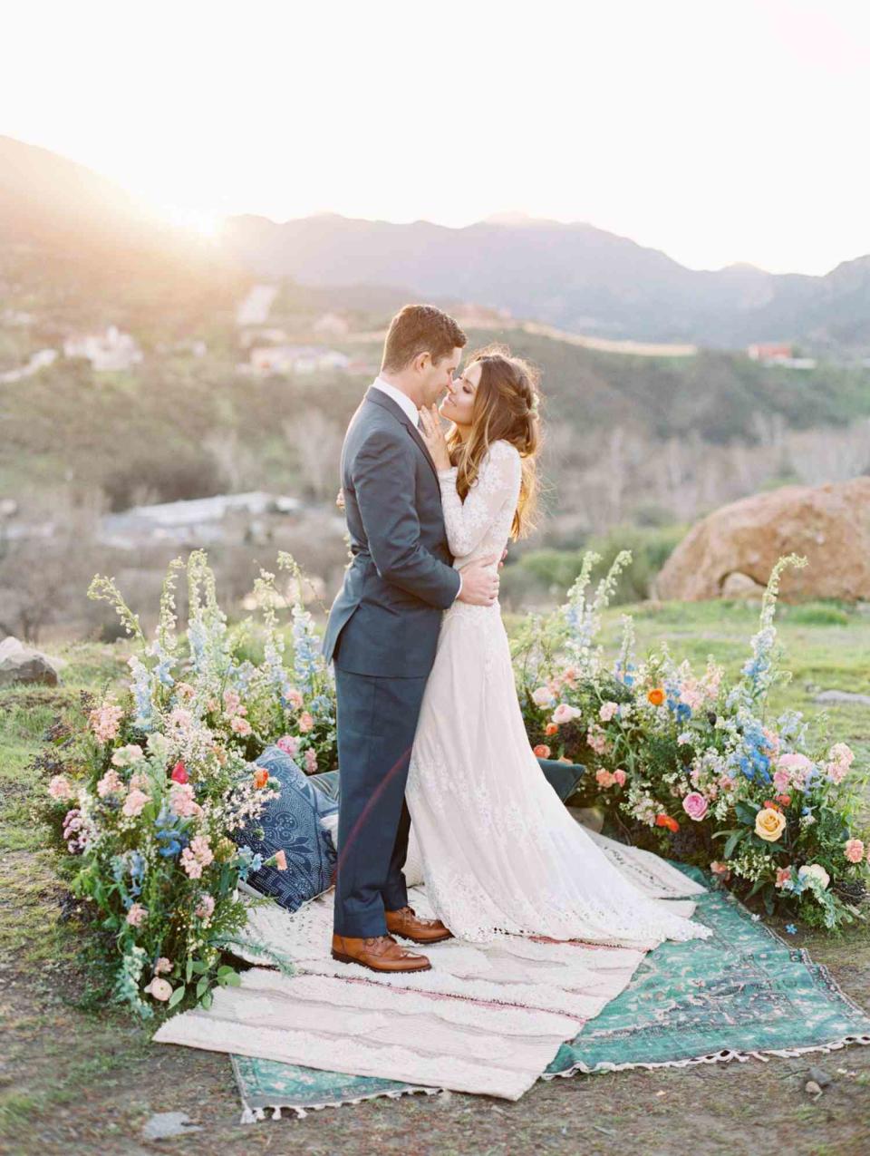 A Bohemian Wedding Trend We're Loving: Ceremony Aisles with Rugs