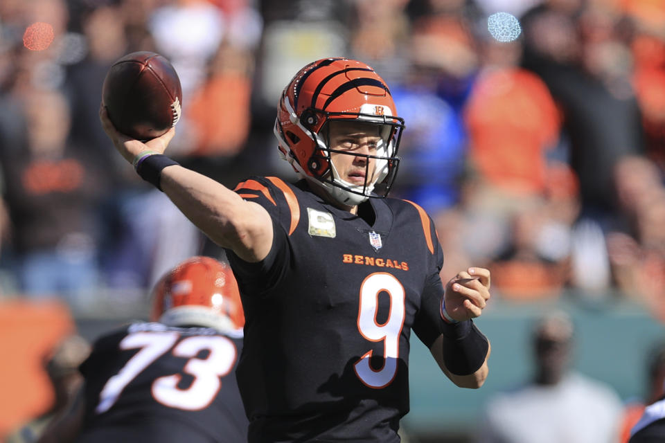 Cincinnati Bengals quarterback Joe Burrow (9) throws during the first half of an NFL football game against the Cleveland Browns, Sunday, Nov. 7, 2021, in Cincinnati. (AP Photo/Aaron Doster)