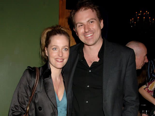 <p>Dave M. Benett/Getty</p> Gillian Anderson and Mark Griffiths attend the UK film screening of 'Straightheads' on April 17, 2007 in London, England.