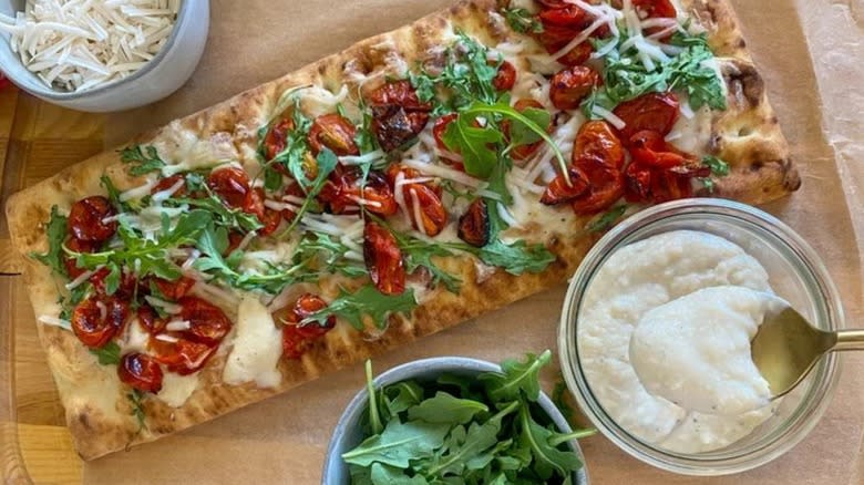 pizza with creamy white sauce